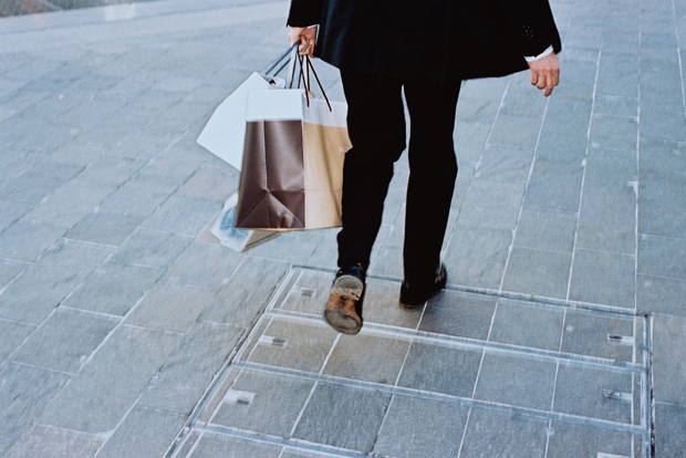 man holding shopping bag