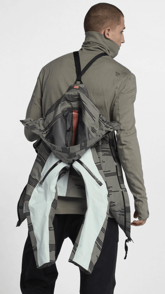 Nike ACG 3-in-1 System being shown off worn on a man's back